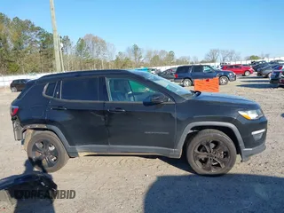 2019 Jeep Compass Latitude with VIN 3C4NJDBB1KT661261, listed as a IAAI auction lot 41883403 with 207,304 mi miles and . Bid and sale history available at DreamBid. Image 14.