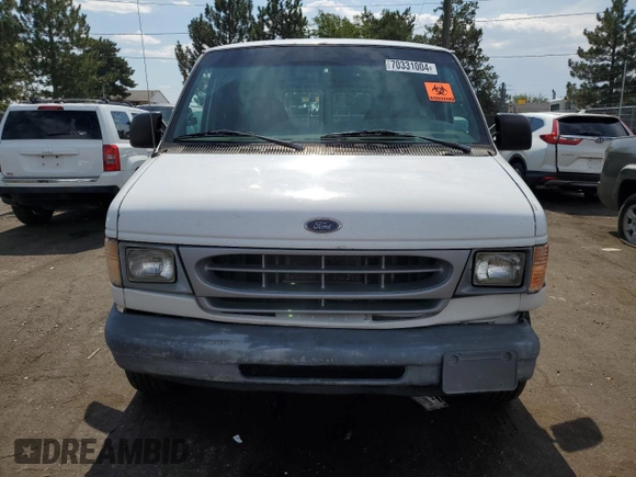 1999 Ford Econoline Cargo with VIN 1FTRE1429XHA29986, listed as a Copart auction lot 70331004 with 312,901 mi miles and Non Repairable. Bid and sale history available at carsss.com. Image 5.
