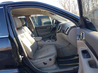 2011 Jeep Grand Cherokee 70th Anniversary with VIN 1J4RR4GT8BC504618, listed as a IAAI auction lot 40993960 with 188,098 mi miles. Bid and sale history available at carsss.com. Image 5.