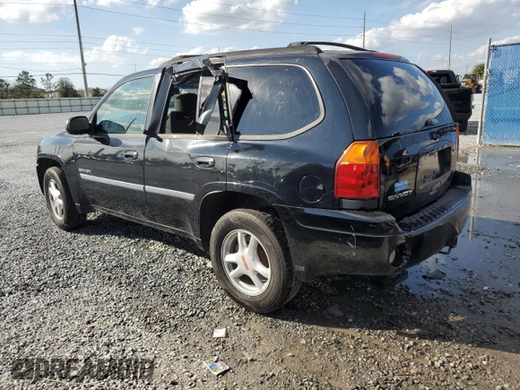 2006 GMC Envoy SLT with VIN 1GKDT13S062230103, listed as a Copart auction lot 44923425 with 158,020 mi miles and Salvage Title. Bid and sale history available at carsss.com. Image 2.