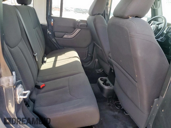 2017 Jeep Wrangler Unlimited Sport with VIN 1C4BJWDG7HL607071, listed as a Copart auction lot 63699585 with Not provided miles and Salvage title. Bid and sale history available at DreamBid. Image 11.