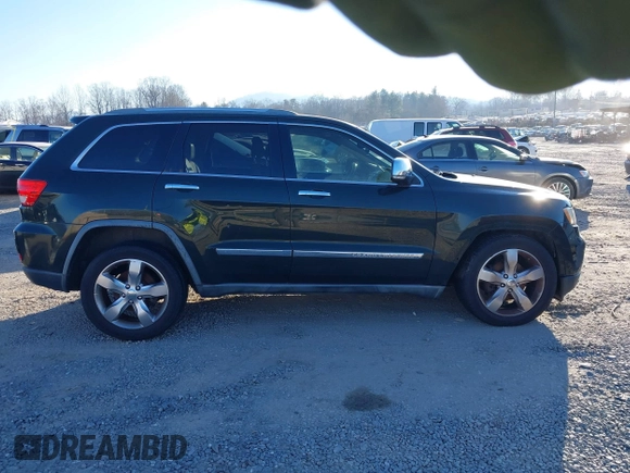 2011 Jeep Grand Cherokee Overland with VIN 1J4RS6GT3BC583261, listed as a IAAI auction lot 41265641 with 184,984 mi miles and . Bid and sale history available at DreamBid. Image 14.