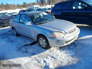 1998 Honda Civic EX with VIN 1HGEJ8242WL114947, listed as a IAAI auction lot 41630431 with 124,702 mi miles. Bid and sale history available at carsss.com. Image 1.