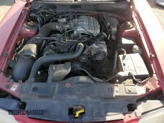 1998 Ford Mustang z VIN 1FAFP4044WF142556, wystawiony jako Copart lot #51642505 z przebiegiem 146 962 mil mil oraz Szkoda całkowita • Salvage title. Historia ofert i sprzedaży dostępna na DreamBid. Obrazek 11.