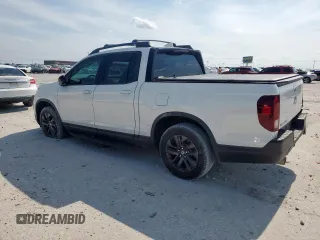2021 Honda Ridgeline Sport with VIN 5FPYK3F13MB002628, listed as a Copart auction lot 59180075 with 79,454 mi miles and Salvage title. Bid and sale history available at DreamBid. Image 2.