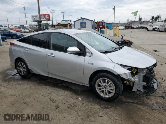 2022 Toyota Prius LE с VIN JTDKAMFP5N3202100, выставлен на аукционе Copart как лот 59570825 с пробегом 32 941 миль миль и Списание • Salvage title. История ставок и продаж доступна на DreamBid. Изображение 4.