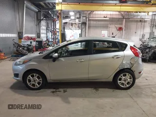 2016 Ford Fiesta SE with VIN 3FADP4EJ9GM197205, listed as a IAAI auction lot 41815313 with 115,689 mi miles. Bid and sale history available at carsss.com. Image 14.