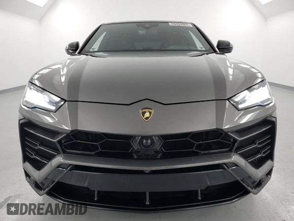 2022 Lamborghini Urus z VIN ZPBUA1ZLXNLA16447, wystawiony jako Copart lot #69403664 z przebiegiem 28 166 mil mil oraz Szkody całkowita. Historia ofert i sprzedaży dostępna na DreamBid. Obrazek 5.