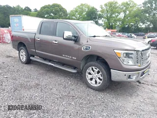 2016 Nissan Titan SL z VIN 1N6BA1F46GN504066, wystawiony jako IAAI lot #42392909 z przebiegiem 124 130 mil mil oraz . Historia ofert i sprzedaży dostępna na DreamBid. Obrazek 1.