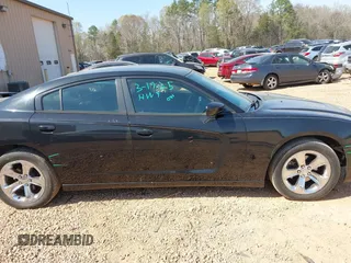2014 Dodge Charger SE with VIN 2C3CDXBG4EH137969, listed as a IAAI auction lot 41909252 with 149,126 mi miles and . Bid and sale history available at carsss.com. Image 14.