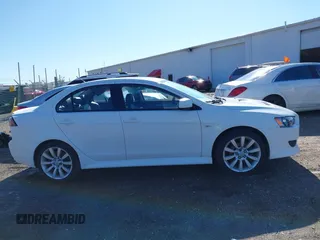 2011 Mitsubishi Lancer GTS with VIN JA32U8FW3BU030708, listed as a IAAI auction lot 41826170 with 213,889 mi miles. Bid and sale history available at carsss.com. Image 13.