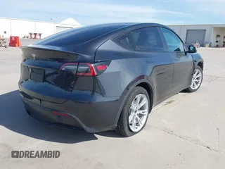 2024 Tesla Model Y with VIN 7SAYGDED9RF044789, listed as a IAAI auction lot 41817318 with Not Provided miles and . Bid and sale history available at carsss.com. Image 4.