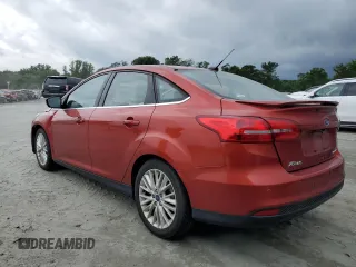 2018 Ford Focus Titanium with VIN 1FADP3J26JL284299, listed as a Copart auction lot 58908325 with 79,331 mi miles and Salvage title. Bid and sale history available at DreamBid. Image 2.