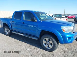 2005 Toyota Tacoma PreRunner z VIN 5TEJU62N55Z122817, wystawiony jako IAAI lot #42009126 z przebiegiem 152 910 mil mil oraz . Historia ofert i sprzedaży dostępna na DreamBid. Obrazek 1.