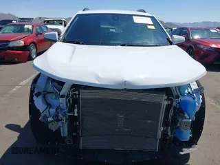 2023 Chevrolet Equinox RS with VIN 3GNAXMEG0PL111407, listed as a IAAI auction lot 41985925 with 34,283 mi miles and . Bid and sale history available at DreamBid. Image 6.