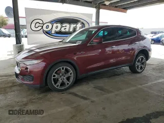 2018 Maserati Levante z VIN ZN661XUA4JX268883, wystawiony jako Copart lot #55102575 z przebiegiem 91 638 mil mil oraz Tytuł czysty. Historia ofert i sprzedaży dostępna na DreamBid. Obrazek 1.