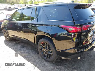 2023 Chevrolet Traverse Premier with VIN 1GNERKKW5PJ128805, listed as a IAAI auction lot 42032622 with 36,463 mi miles and . Bid and sale history available at DreamBid. Image 3.