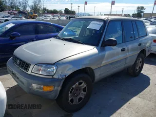 1999 Toyota RAV4 with VIN JT3GP10V0X7050673, listed as a IAAI auction lot 41625555 with 357,682 mi miles and . Bid and sale history available at DreamBid. Image 2.