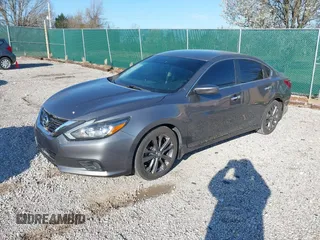 2018 Nissan Altima 2.5 SR with VIN 1N4AL3AP7JC240029, listed as a IAAI auction lot 41883209 with 77,190 mi miles. Bid and sale history available at carsss.com. Image 18.