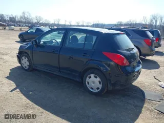 2009 Nissan Versa 1.8 S with VIN 3N1BC13E89L501721, listed as a IAAI auction lot 41770266 with 203,314 mi miles. Bid and sale history available at carsss.com. Image 3.