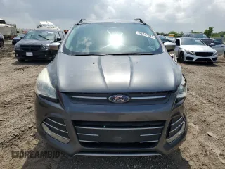 2015 Ford Escape SE with VIN 1FMCU9G95FUC30303, listed as a Copart auction lot 54247645 with 73,944 mi miles and Salvage Title. Bid and sale history available at DreamBid. Image 5.