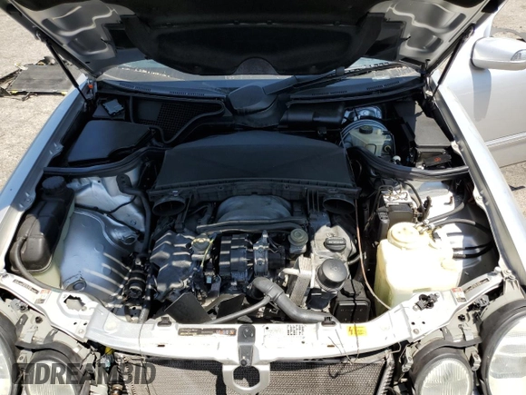 2000 Mercedes-Benz E with VIN WDBJF74J7YB055624, listed as a Copart auction lot 63880184 with 71,355 mi miles and Salvage Title. Bid and sale history available at DreamBid. Image 11.