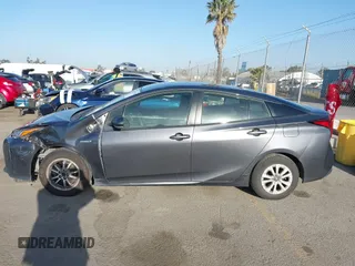 2022 Toyota Prius L Eco with VIN JTDKAMFUXN3188930, listed as a IAAI auction lot 42275661 with 116,934 mi miles and . Bid and sale history available at DreamBid. Image 14.