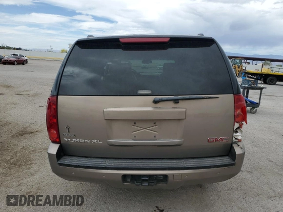2007 GMC Yukon XL SLT z VIN 1GKFK163X7R327673, wystawiony jako Copart lot #52899415 z przebiegiem 147 180 mil mil oraz Szkoda całkowita • Salvage title. Historia ofert i sprzedaży dostępna na DreamBid. Obrazek 6.