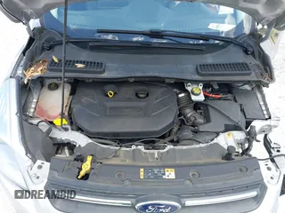 2016 Ford Escape SE with VIN 1FMCU9G92GUC28879, listed as a IAAI auction lot 42021065 with 99,184 mi miles. Bid and sale history available at carsss.com. Image 10.