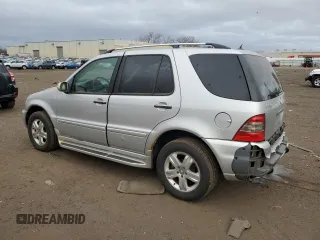 2005 Mercedes-Benz M 500 with VIN 4JGAB75E65A532359, listed as a Copart auction lot 41510825 with 139,916 mi miles and Salvage title. Bid and sale history available at DreamBid. Image 2.