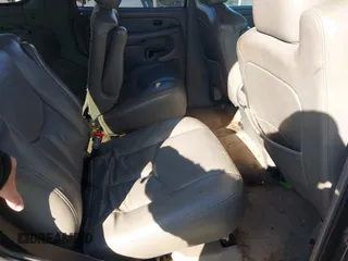 2005 Chevrolet Tahoe LT z VIN 1GNEC13T85J201856, wystawiony jako IAAI lot #41099372 z przebiegiem 303 169 mil mil oraz . Historia ofert i sprzedaży dostępna na DreamBid. Obrazek 8.