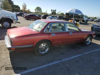 1994 Jaguar XJ with VIN SAJKX1747RC690894, listed as a Copart auction lot 88499345 with 24,006 mi miles and Clean Title. Bid and sale history available at DreamBid. Image 3.