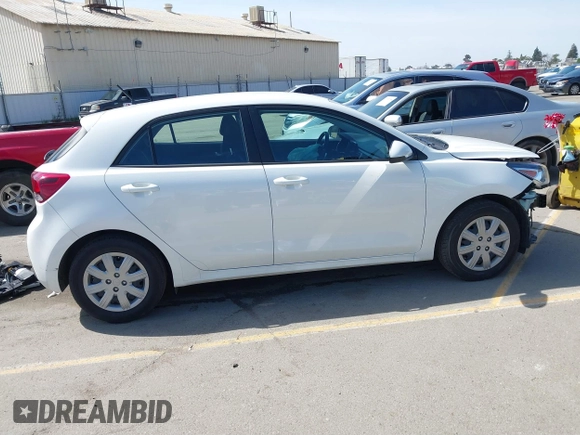 2023 Kia Rio S with VIN 3KPA25AD0PE629868, listed as a IAAI auction lot 41738952 with 25,642 mi miles and . Bid and sale history available at DreamBid. Image 14.