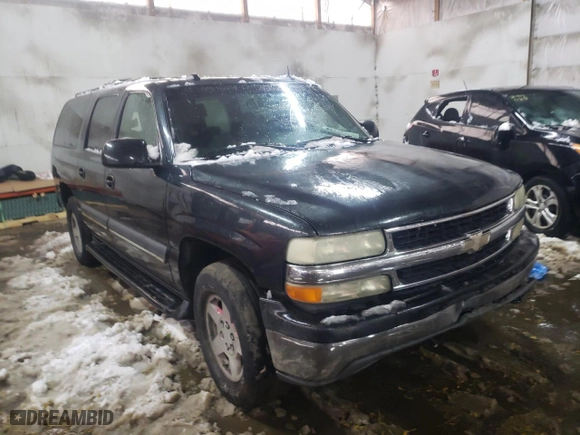 2004 Chevrolet Suburban LT with VIN 1GNFK16Z24J165975, listed as a Copart auction lot 79915414 with 302,930 mi miles and Salvage Title. Bid and sale history available at carsss.com. Image 4.