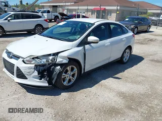 2013 Ford Focus SE with VIN 1FADP3F23DL218239, listed as a IAAI auction lot 42331440 with 156,501 mi miles and . Bid and sale history available at DreamBid. Image 18.