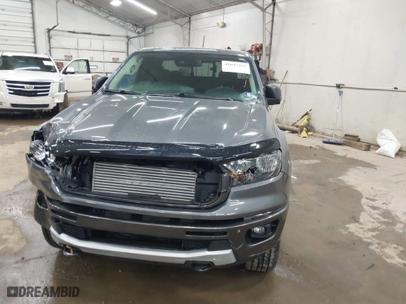 2021 Ford Ranger XL with VIN 1FTER1FH1MLD84759, listed as a IAAI auction lot 42043263 with 8,874 mi miles. Bid and sale history available at carsss.com. Image 12.