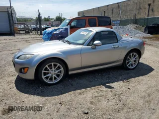 2011 Mazda MX-5 Miata Grand Touring with VIN JM1NC2PF0B0215349, listed as a Copart auction lot 64852175 with 22,154 mi miles and Clean title. Bid and sale history available at DreamBid. Image 1.