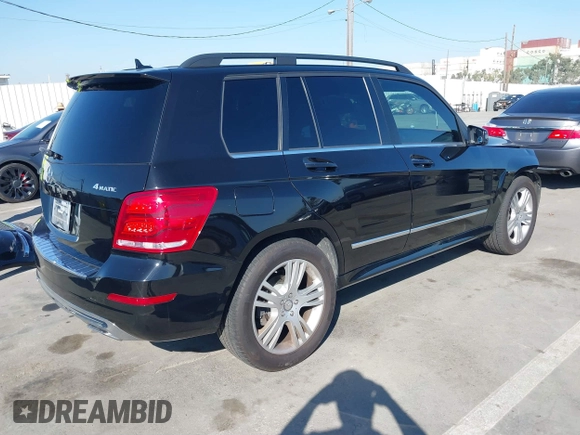 2015 Mercedes-Benz GLK with VIN WDCGG8JB8FG408944, listed as a IAAI auction lot 41615047 with 97,152 mi miles. Bid and sale history available at carsss.com. Image 4.