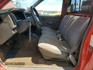 1992 Nissan Frontier z VIN 1N6SD11S0NC356308, wystawiony jako Copart lot #55831745 z przebiegiem 327 113 mil mil oraz Szkoda całkowita • Salvage title. Historia ofert i sprzedaży dostępna na DreamBid. Obrazek 7.
