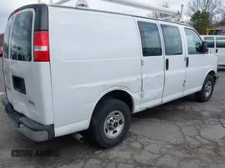 2016 GMC Savana Cargo Van with VIN 1GTW7AFF8G1194935, listed as a IAAI auction lot 41843488 with 164,441 mi miles. Bid and sale history available at carsss.com. Image 4.