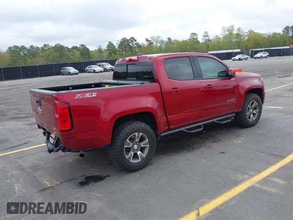 2020 Chevrolet Colorado 4WD Z71 with VIN 1GCGTDEN3L1132444, listed as a IAAI auction lot 41898911 with 65,493 mi miles and . Bid and sale history available at DreamBid. Image 4.