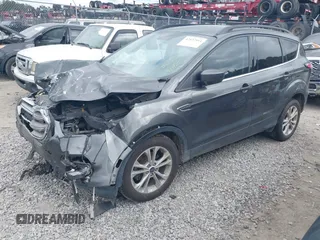 2017 Ford Escape SE z VIN 1FMCU0GD8HUE00754, wystawiony jako IAAI lot #42127911 z przebiegiem 169 487 mil mil oraz . Historia ofert i sprzedaży dostępna na DreamBid. Obrazek 2.
