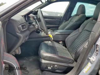 2023 Maserati Levante with VIN ZN661YUM5PX411140, listed as a Copart auction lot 65411165 with 12,053 mi miles and Salvage title. Bid and sale history available at DreamBid. Image 7.