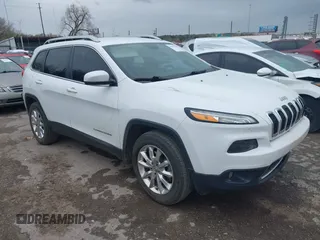 2016 Jeep Cherokee Limited z VIN 1C4PJMDS6GW182082, wystawiony jako IAAI lot #41943408 z przebiegiem 141 796 mil mil oraz . Historia ofert i sprzedaży dostępna na DreamBid. Obrazek 1.