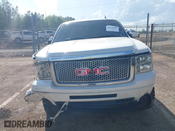 2010 GMC Sierra 1500 Denali z VIN 3GTRKXE26AG222270, wystawiony jako IAAI lot #41974112 z przebiegiem 166 366 mil mil oraz . Historia ofert i sprzedaży dostępna na DreamBid. Obrazek 13.