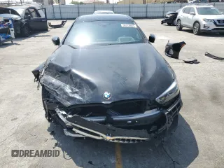 2020 BMW 8 Series M850i with VIN WBAGV8C01LCE50737, listed as a Copart auction lot 58318665 with Not provided miles and Salvage title. Bid and sale history available at DreamBid. Image 5.