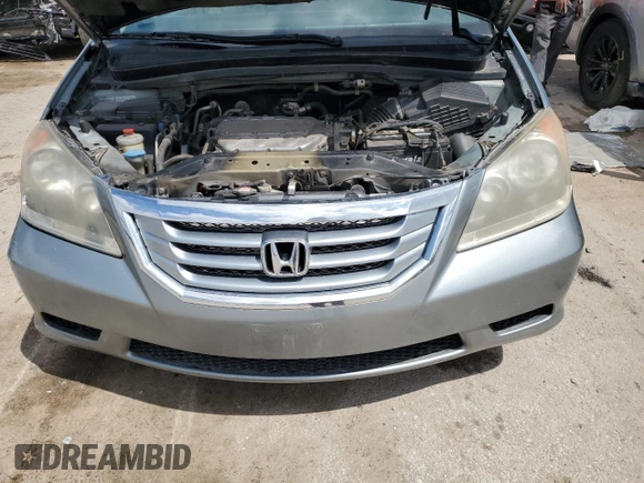 2010 Honda Odyssey EX-L с VIN 5FNRL3H79AB073307, выставлен на аукционе Copart как лот 55642225 с пробегом Не указан миль и Списание • Salvage title. История ставок и продаж доступна на DreamBid. Изображение 12.