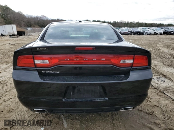 2013 Dodge Charger SE z VIN 2C3CDXBG3DH566891, wystawiony jako Copart lot #50501075 z przebiegiem 176 024 mil mil oraz Szkody całkowita. Historia ofert i sprzedaży dostępna na DreamBid. Obrazek 6.