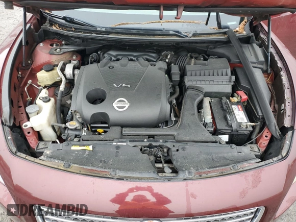 2010 Nissan Maxima SV z VIN 1N4AA5AP7AC836369, wystawiony jako Copart lot #57100855 z przebiegiem Nie podano mil oraz Czysty tytuł • Clean title. Historia ofert i sprzedaży dostępna na DreamBid. Obrazek 11.