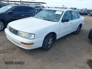 1997 Toyota Avalon XL with VIN 4T1BF12B6VU169432, listed as a IAAI auction lot 42183786 with 288,845 mi miles and . Bid and sale history available at DreamBid. Image 2.